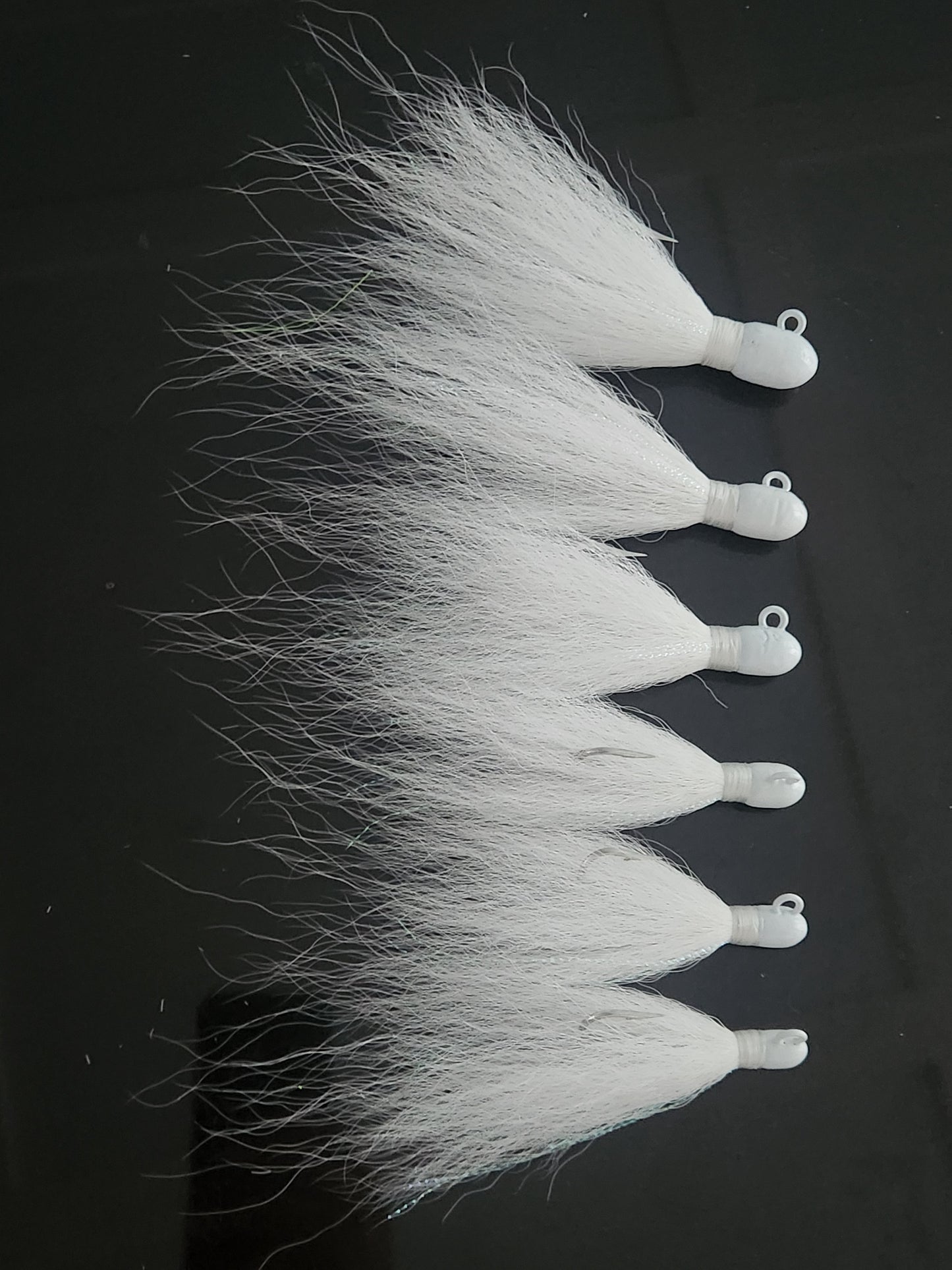 White bucktail jig with extra long hair.