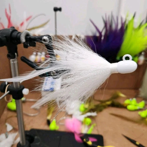 All white custom bucktail on bullet jig.